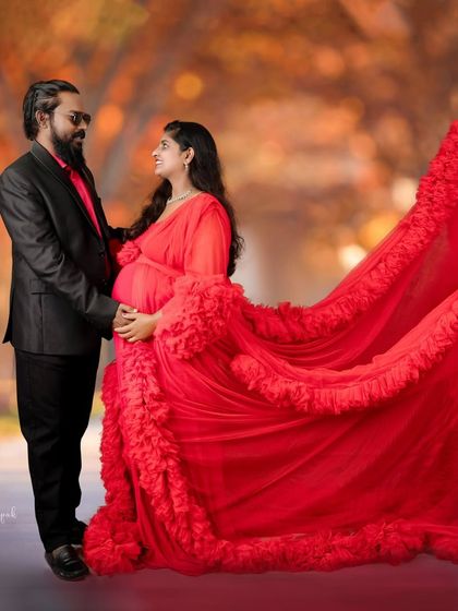 A dreamy, artistic portrait of the couple against a beautiful autumn-themed backdrop.