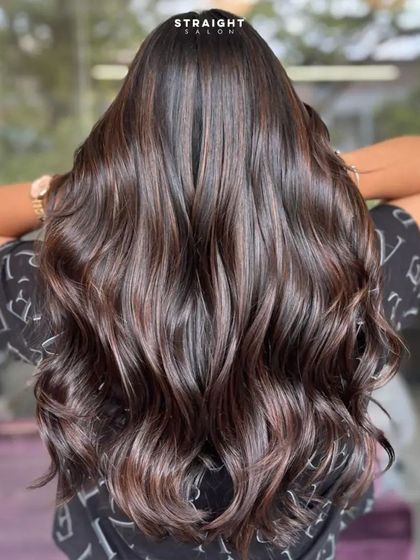 A back view of the princess hair, showing off the volume and shine.