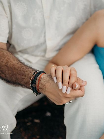 I love focusing on the small details, like the way a couple holds hands. This close-up shot tells a story of connection and intimacy all on its own.