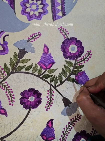 A close-up, work-in-progress shot of a Kalamkari-style painting. This shows the careful, hands-on process of building up layers of color and detail with a fine brush, which is the soul of all my handmade art.