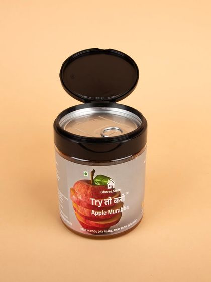 An open-lid shot of the Apple Murabba, highlighting the product's secure packaging.