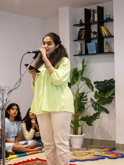 The energy in the room during a performance at our studio. The connection between the artist and the audience is what makes our open mics so special.