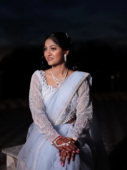 A serene portrait of the bride. Her makeup is subtle and elegant, letting her natural beauty be the focus.