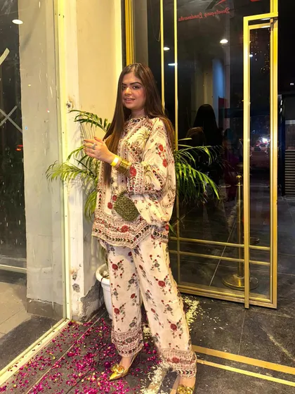 A festive kaftan-style co-ord set from Glamistaa. The relaxed silhouette and intricate print make it a stylish yet comfortable option for card parties or family dinners.