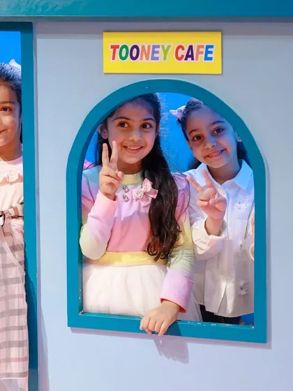 Peace and smiles from the team at the Tooney Cafe. It's a wonderful spot for group pretend play and making friends.