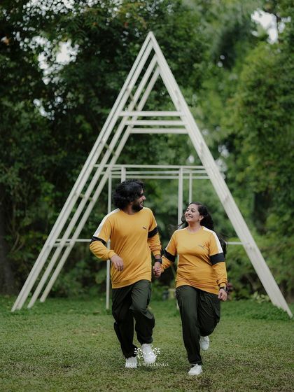 A dynamic shot of the couple running hand-in-hand, their joy and energy perfectly captured.