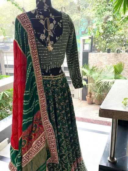The back view of the complete lehenga set, showing how beautifully the dupatta drapes.