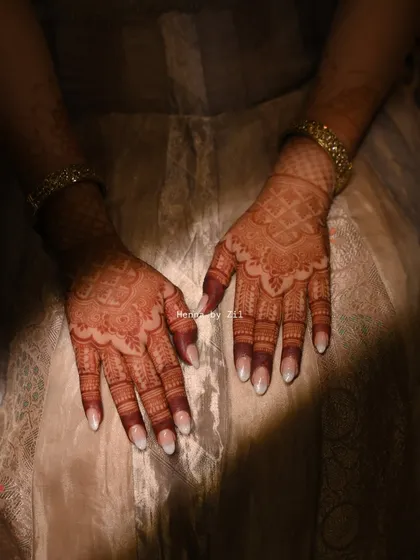 The deep, dark stain looks so elegant, especially with the bride's beautiful manicure.