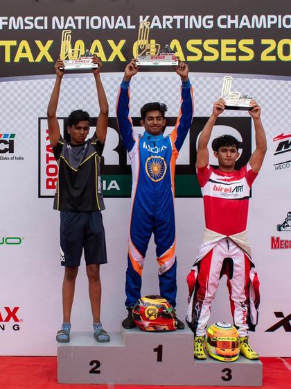 Hunner Singh proudly takes the P2 spot on the podium during the 2024 Rotax Max Round 2, showcasing his consistent performance and determination.