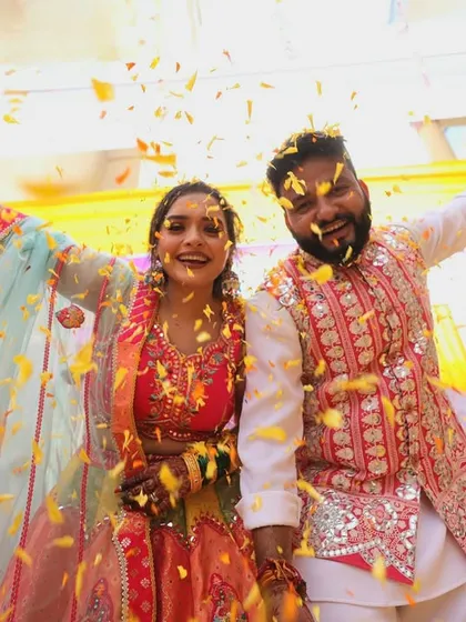 Nothing beats the energy of a Phoolon ki Holi. We organized this vibrant haldi carnival, showering the happy couple in flower petals. It’s pure, unadulterated joy and makes for the best pictures.