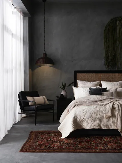 This shot for a home living brand showcases my ability to create a rich, moody atmosphere that feels both aspirational and attainable. By carefully balancing light and shadow, we highlighted the textures of the bedding, rug, and furniture to build a complete, inviting bedroom scene.