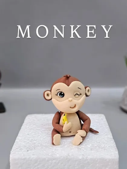 The cheeky winking monkey with a banana. Adding personality to each animal makes your cake so much more engaging.