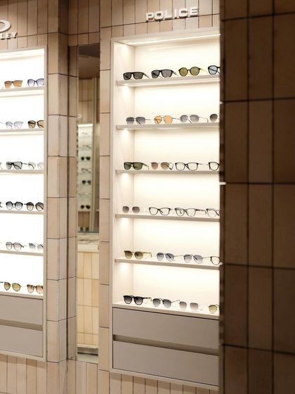 Backlit shelving ensures every pair of glasses is perfectly highlighted, turning the product into a key element of the store's decor.