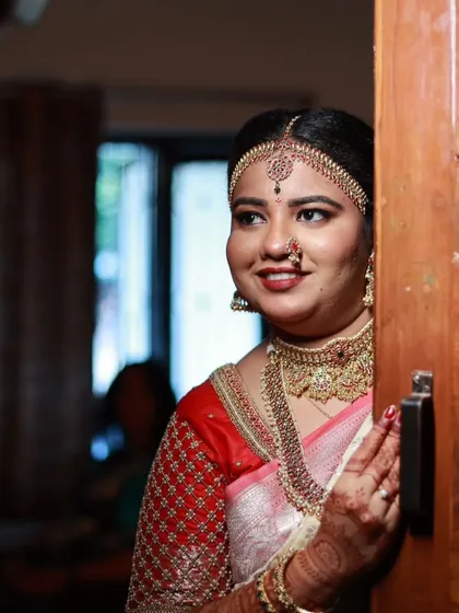 Another lovely candid shot, capturing the bride's happy expression.