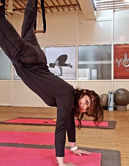 Using the aerial hammock for support in an assisted handstand. This is a great way for students to build the strength and confidence needed for inversions without fear of falling.