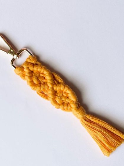 A single, bright yellow keychain. It's like a little drop of sunshine.