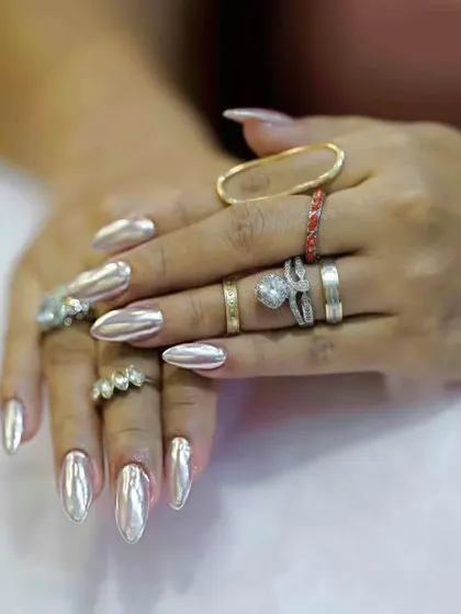 When you want to stop traffic, you go for full liquid-metal chrome. These silver chrome nails are bold, futuristic, and guaranteed to make a statement.