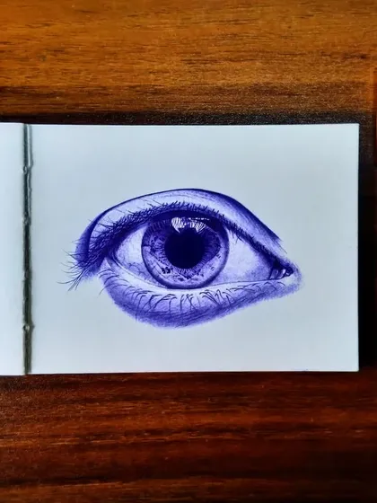 Another ballpoint pen eye sketch. I enjoy the challenge of creating these detailed drawings with a common pen, focusing on the reflections and texture of the iris.