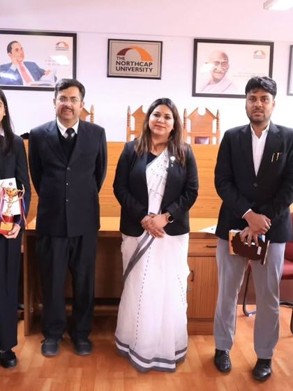 Posing with the winners of the moot court competition. Their success is a testament to their dedication and the high quality of legal education they are receiving.