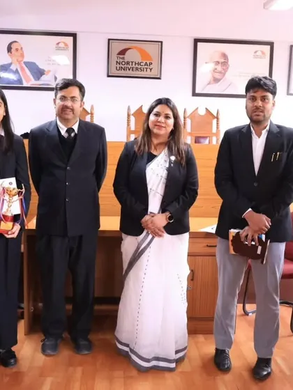 Posing with the winners of the moot court competition. Their success is a testament to their dedication and the high quality of legal education they are receiving.