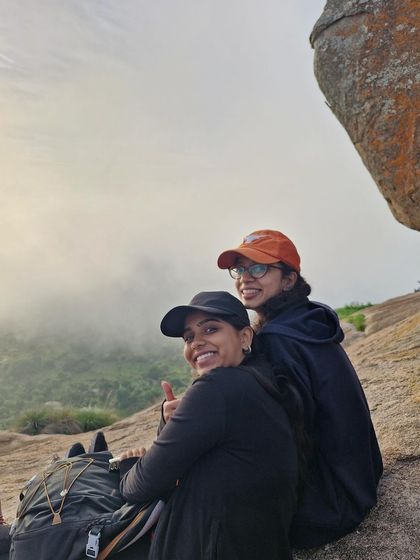Two friends enjoying the misty morning at Uttari Betta.