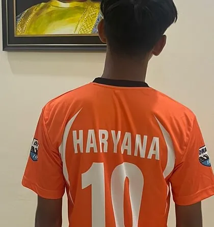 The back of the jersey says it all. Representing the state of Haryana at the national level.