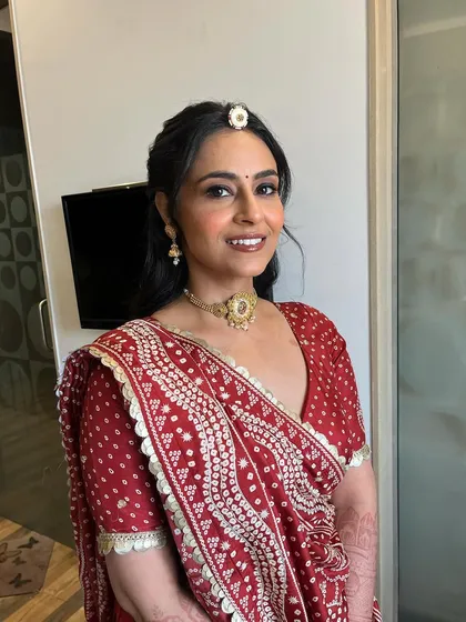 A beautiful smile from a happy client. This soft glam engagement makeup ensures the bride feels comfortable and looks radiant.