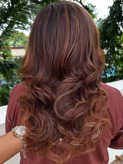 Travel ready. A good hair color and style can make you feel put-together and confident, no matter where you're heading. This warm, multi-tonal look is perfect for any adventure.