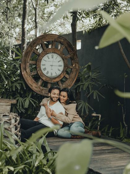A tender moment shared between the couple, framed by the natural beauty of a garden. These are the simple, heartfelt images I love to create.