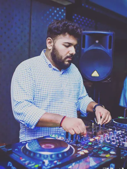 Focused on the mix. I take pride in my craft, ensuring every detail is perfect to deliver a high-quality audio experience for your guests.