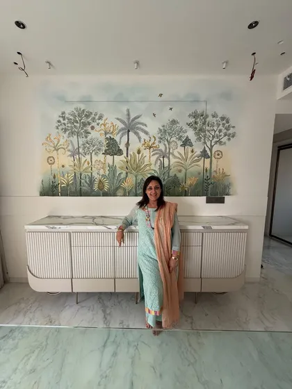 The completed 3D wall mural above the dining console. The combination of textures and soft colors creates a beautiful focal point that is both artistic and serene.
