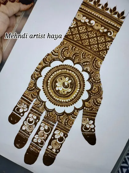 This angle emphasizes the clean, crisp lines of the mandala outline and the surrounding patterns. Control over your line work is something I stress in every class.