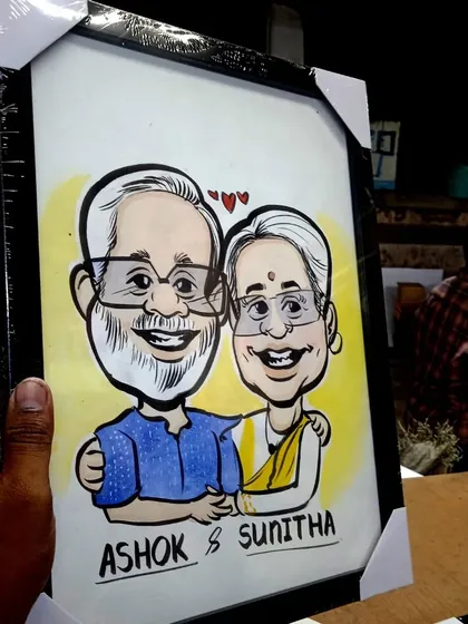 A closer look at a framed caricature, perfect for an anniversary or birthday gift. Each piece is drawn by hand based on the photos you provide.