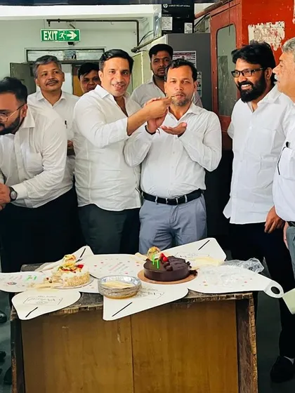 Celebrating a colleague's birthday at the court complex. These moments of shared joy strengthen our bonds as a professional community.