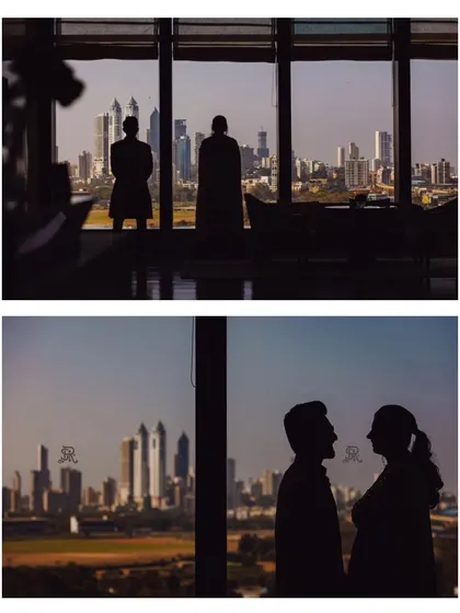 A silhouette of the couple against the Mumbai city skyline. This shot combines the intimacy of the couple with the grandeur of their city, telling a modern love story.