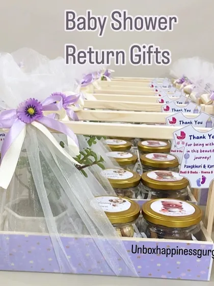 A full display of my lavender-themed baby shower return gifts, featuring delicate tulle, purple ribbons, and personalized thank you tags.