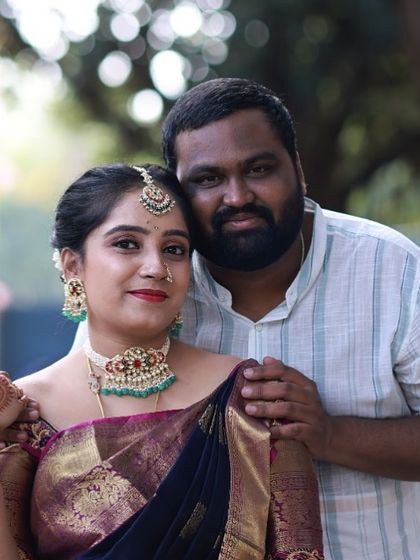 A close-up of Annu's lovely smile and her distinctive jewellery. We love helping clients find pieces that reflect their personal style.