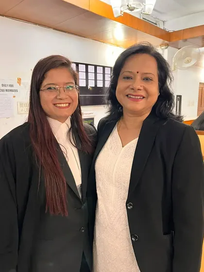 Sharing a happy moment with a senior advocate at the Supreme Court after a win. The legal fraternity is built on mutual respect and shared victories.