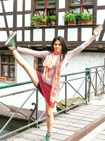 Utthita Hasta Padangusthasana on a bridge. Finding balance amidst the flow of life is what yoga teaches us. Every day is a perfect day for yoga.