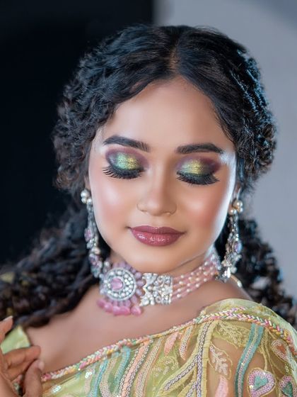 This is a modern Victorian-style choker with pink stones and pearls. It's a very trendy and unique piece.