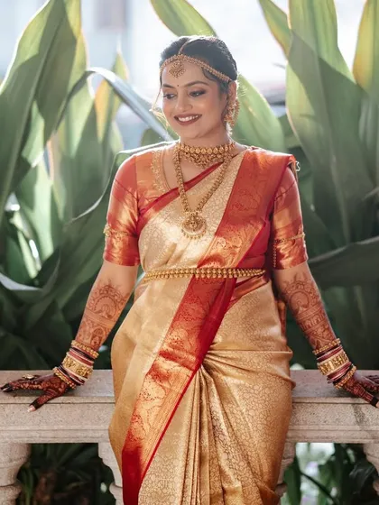 Another beautiful shot of the bride, her traditional attire looking radiant in the natural light.
