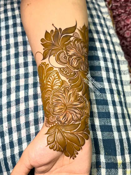 The completed double-flower design. This is a lovely choice for someone who wants more than a single motif but less than a full hand design.