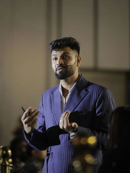 Our client, a public speaker, relies on our suits to look his best. This pinstripe jacket is designed for comfort and style, ensuring he looks sharp and feels confident under the lights.