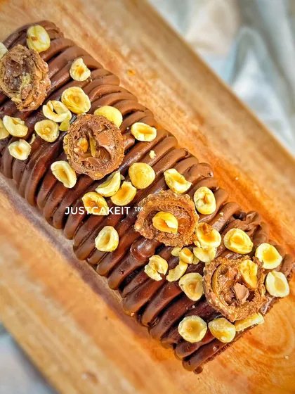 This decadent Ferrero Swiss Roll is a chocolate and hazelnut lover's dream. Made with premium couverture chocolate, it's rich, travel-friendly, and packed with Ferrero Rocher flavor.