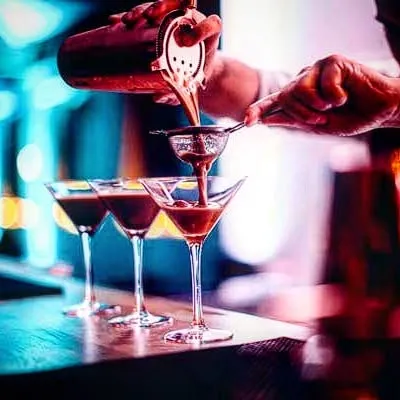 A great cocktail is more than a drink; it's a story. This is our 'After Eight' Martini, a signature creation that balances flavor and experience. My approach to menu engineering is to create these hero drinks that define your bar and keep customers coming back.