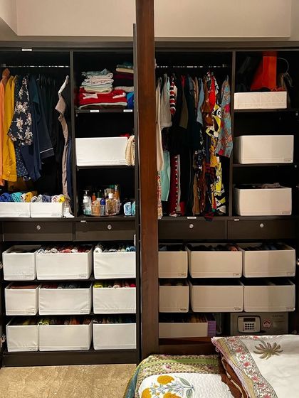 If your resolution is to have a decluttered and organized space, we are here to help. This fully organized wardrobe shows the magic of having a system in place, with bins and folded clothes creating perfect order.