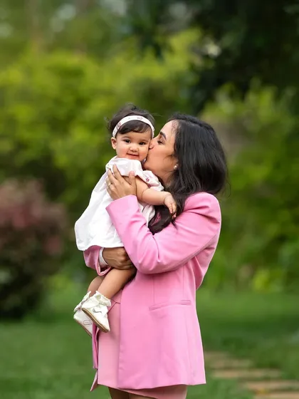 A sweet kiss for a sweet girl. These candid moments are the treasures we find during our outdoor family photoshoots.