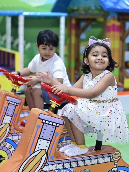 A little princess enjoying a ride on our stationary car toys. It's a perfect photo opportunity and a fun activity for toddlers.