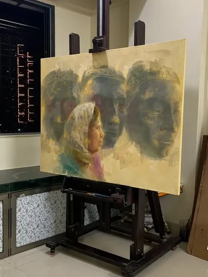 My painting "Echoes in Her Eyes" on the easel in my studio, showing the work in progress.