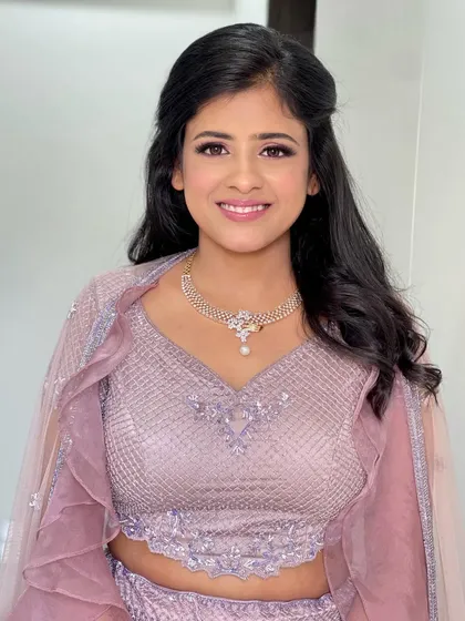 A beautiful smile from this engagement bride. The makeup is simple, fresh, and lets her happiness shine.